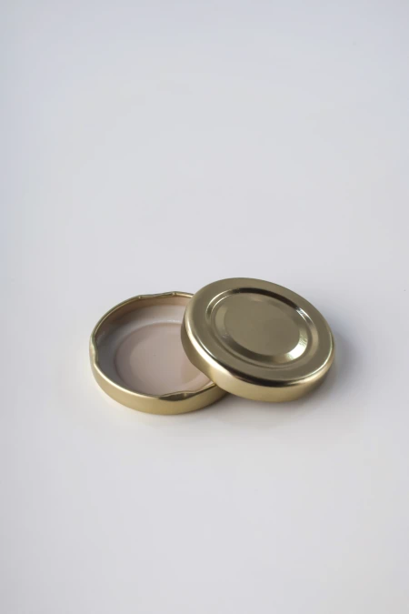 TAPA AXIAL 48 MM DORADA