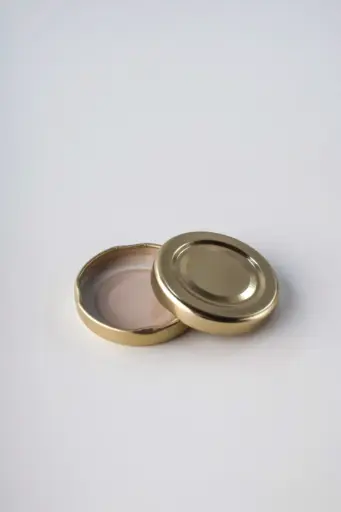 [11001] TAPA AXIAL 48 MM DORADA
